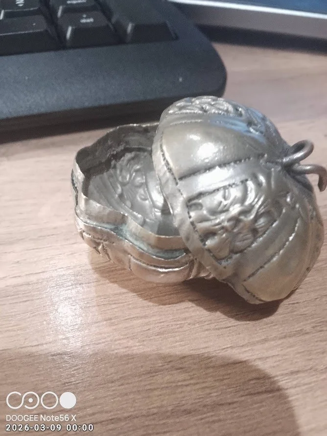 A rare 'Upstairs-Downstairs' survivor—this 11g hollow-form pumpkin was designed to hang from a Victorian lady's or house-maid's chatelaine belt."