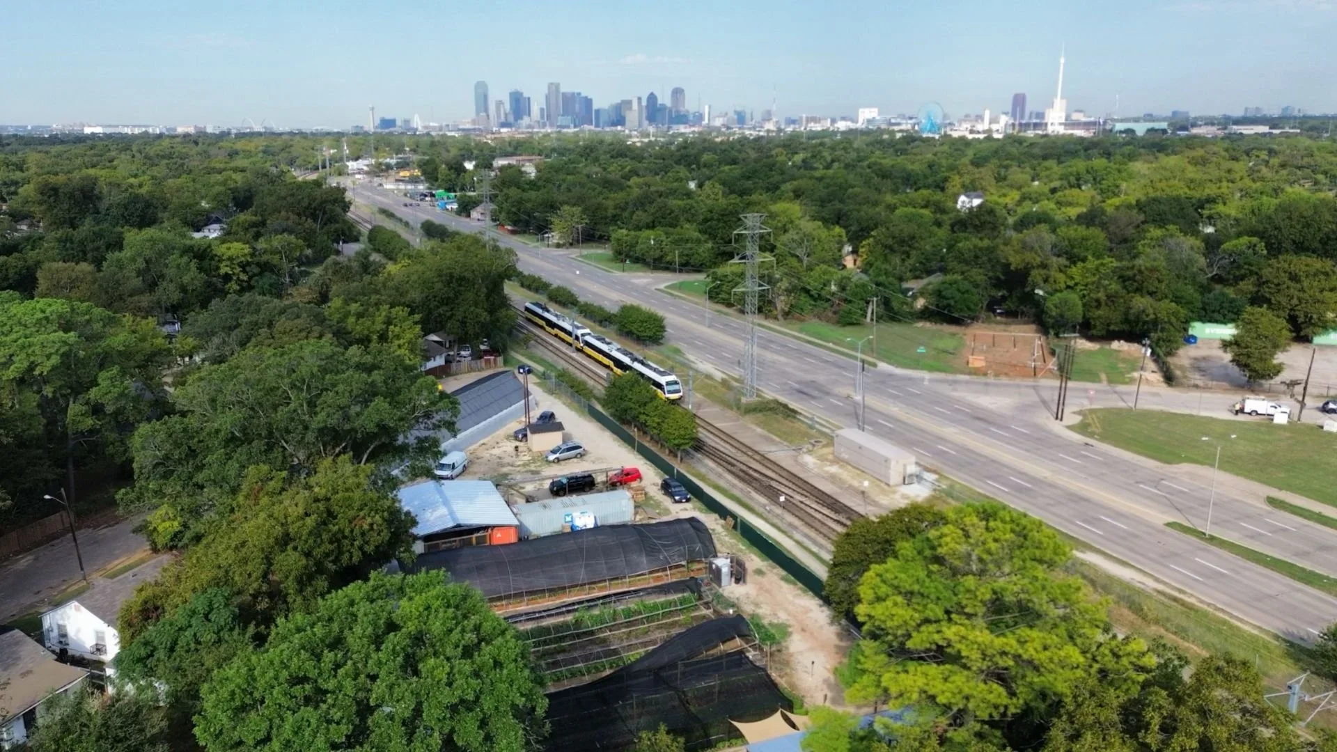 Hatcher+with+Dallas+Downtown+view.webp