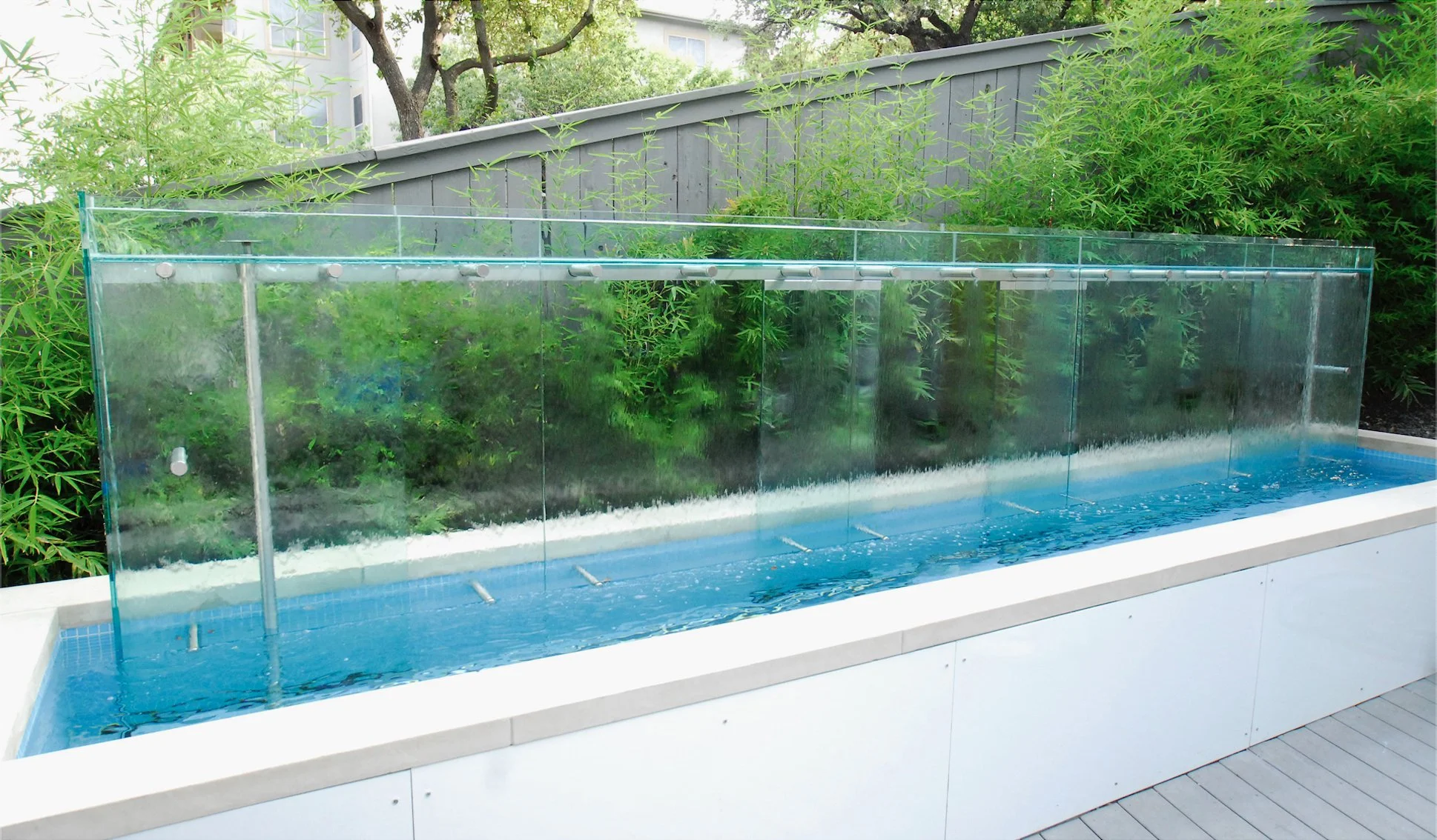 Kimber Modern Hotel Fountain; Austin, TX | 6' x 18' x 3' | glass, stainless steel, tile, lighting