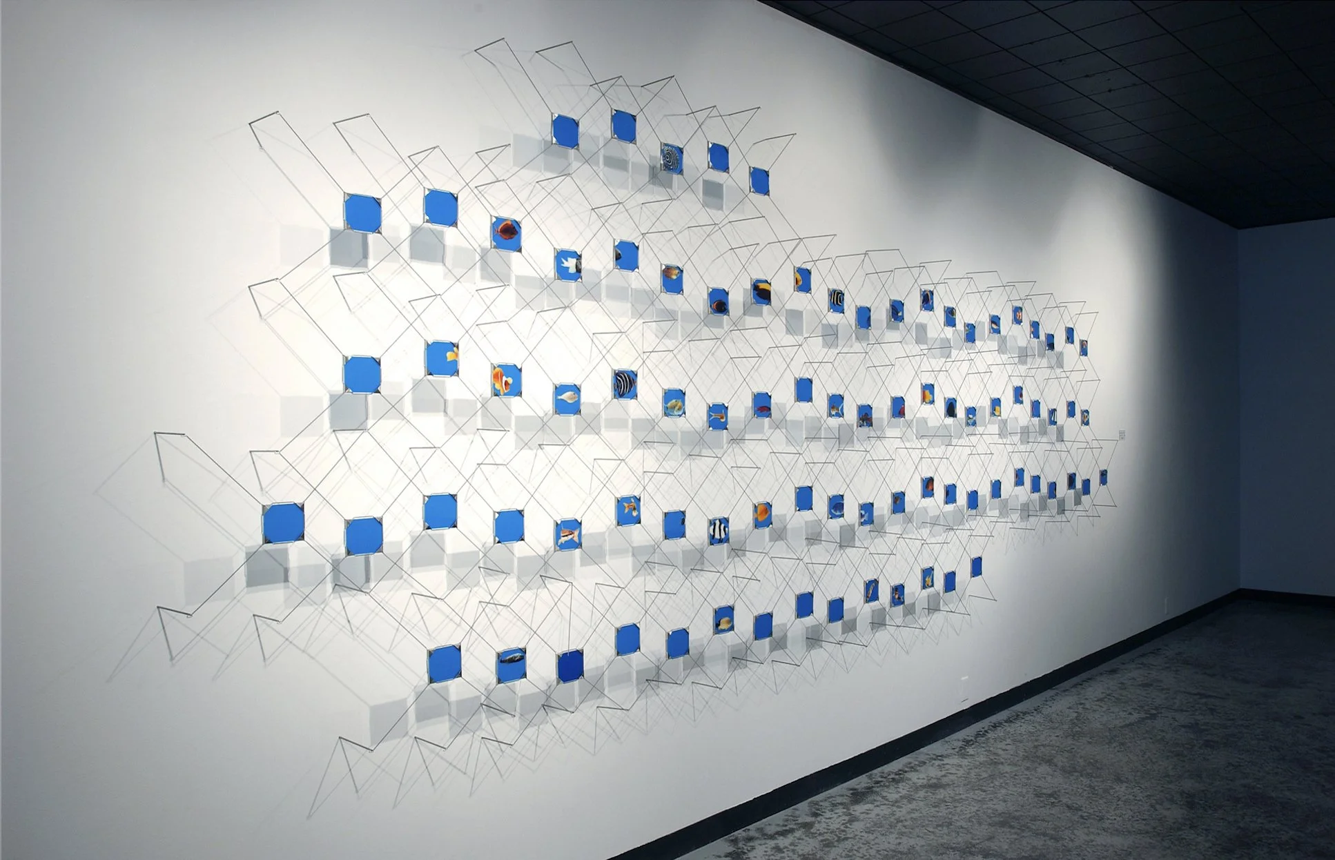 In a Minute There Is Time | 8' x 25' x 6"/3.5" x 5" (each panel) | duratrans prints, stainless steel, Plexiglass