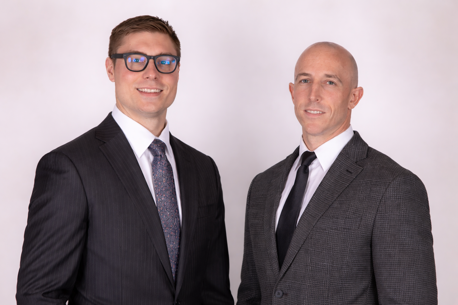 Professional photo of attorneys Jacob Diviney and Ethan Wilt