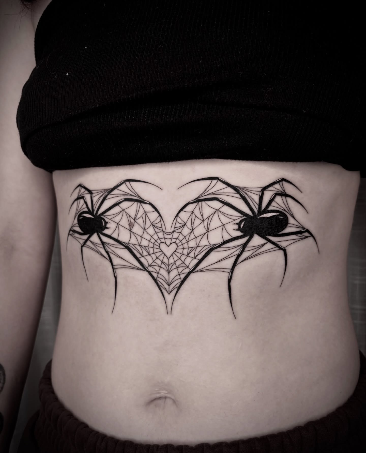 another sick heart shaped spiders tat 🕷️ thank you so much olivia! link in bio to inquire/book 🕸️🖤