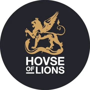 A logo featuring a golden winged lion with a crown on its head, standing on its hind legs, with the text 'HOUSE OF LIONS' below it on a black circular background.