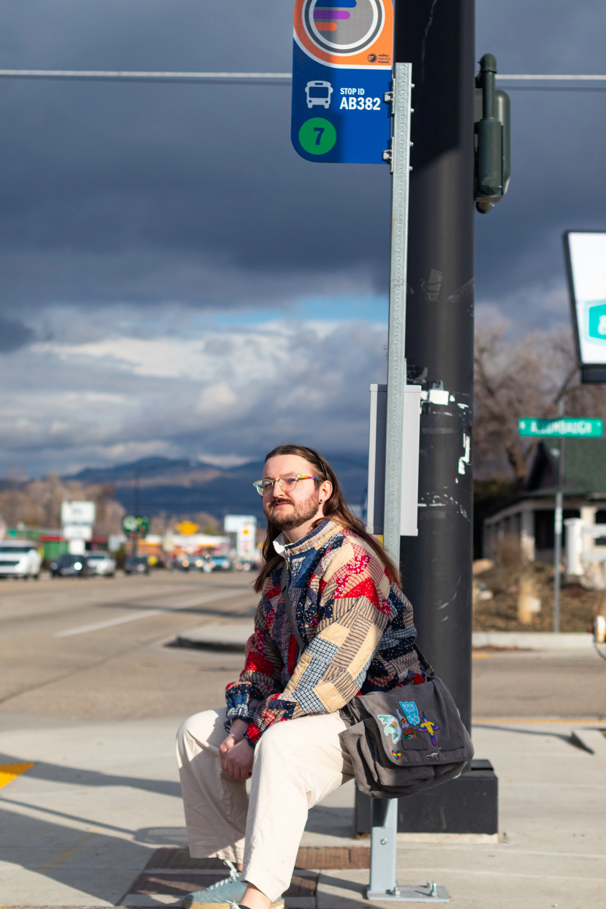 Jeffrey Watkins outside sitting at a Boise bus stop