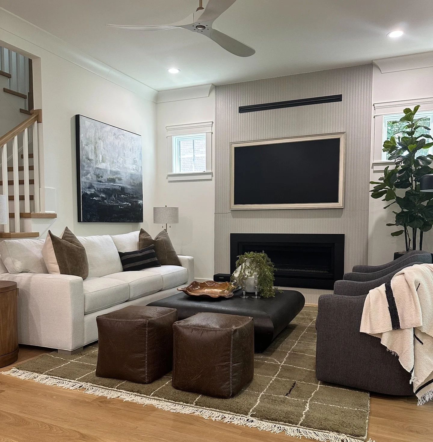 This living room at the Henderson project came together with clean lines, warm textures, and just the right mix of modern and inviting. From the layered seating to the natural accents, every detail was designed to feel effortless and livable.

If you