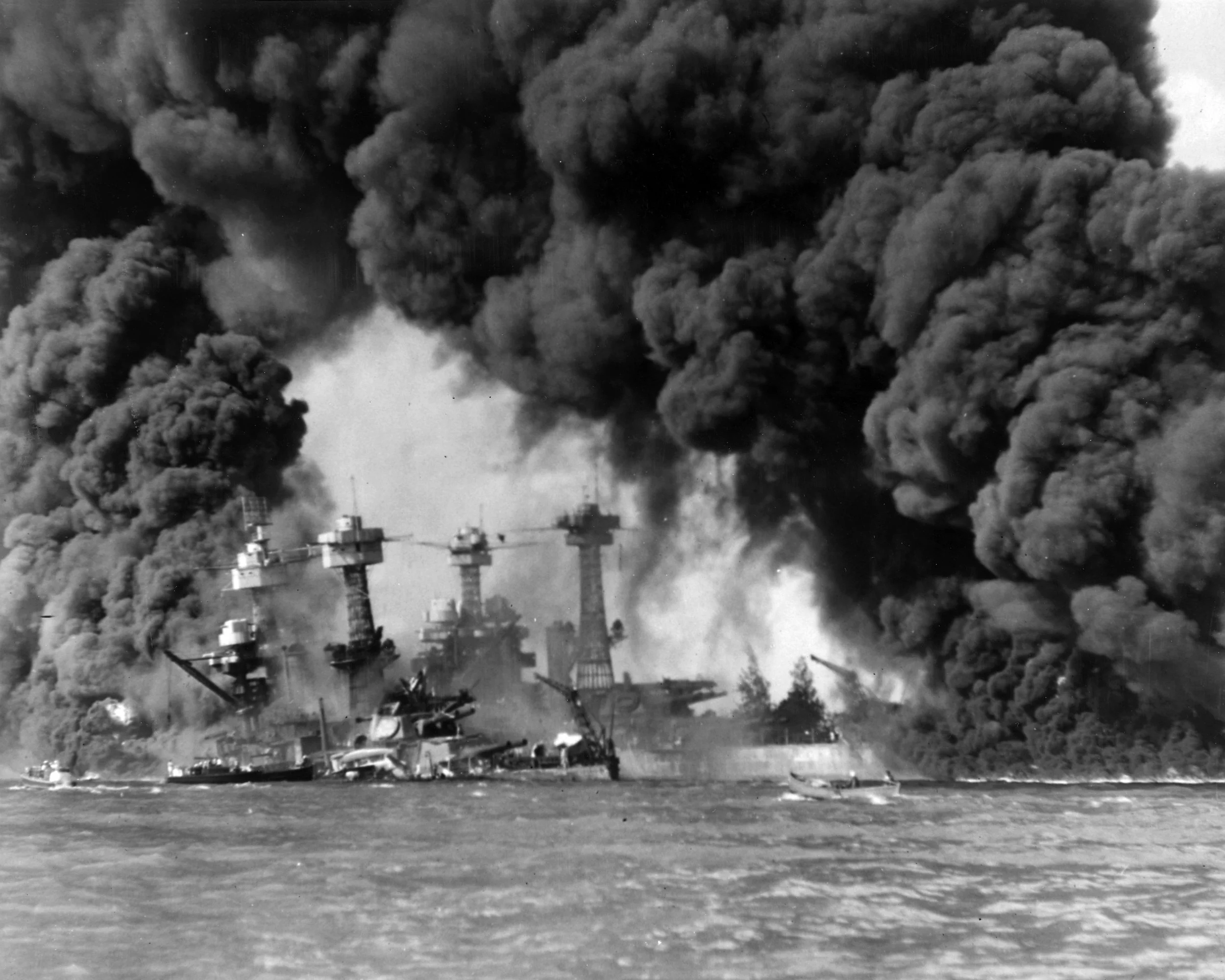 Burning ships at Pearl Harbor (West Virginia & Tennessee in smoke)