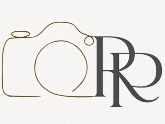 Outline of a camera combined with three overlapping letters R, R, and D in bold font.