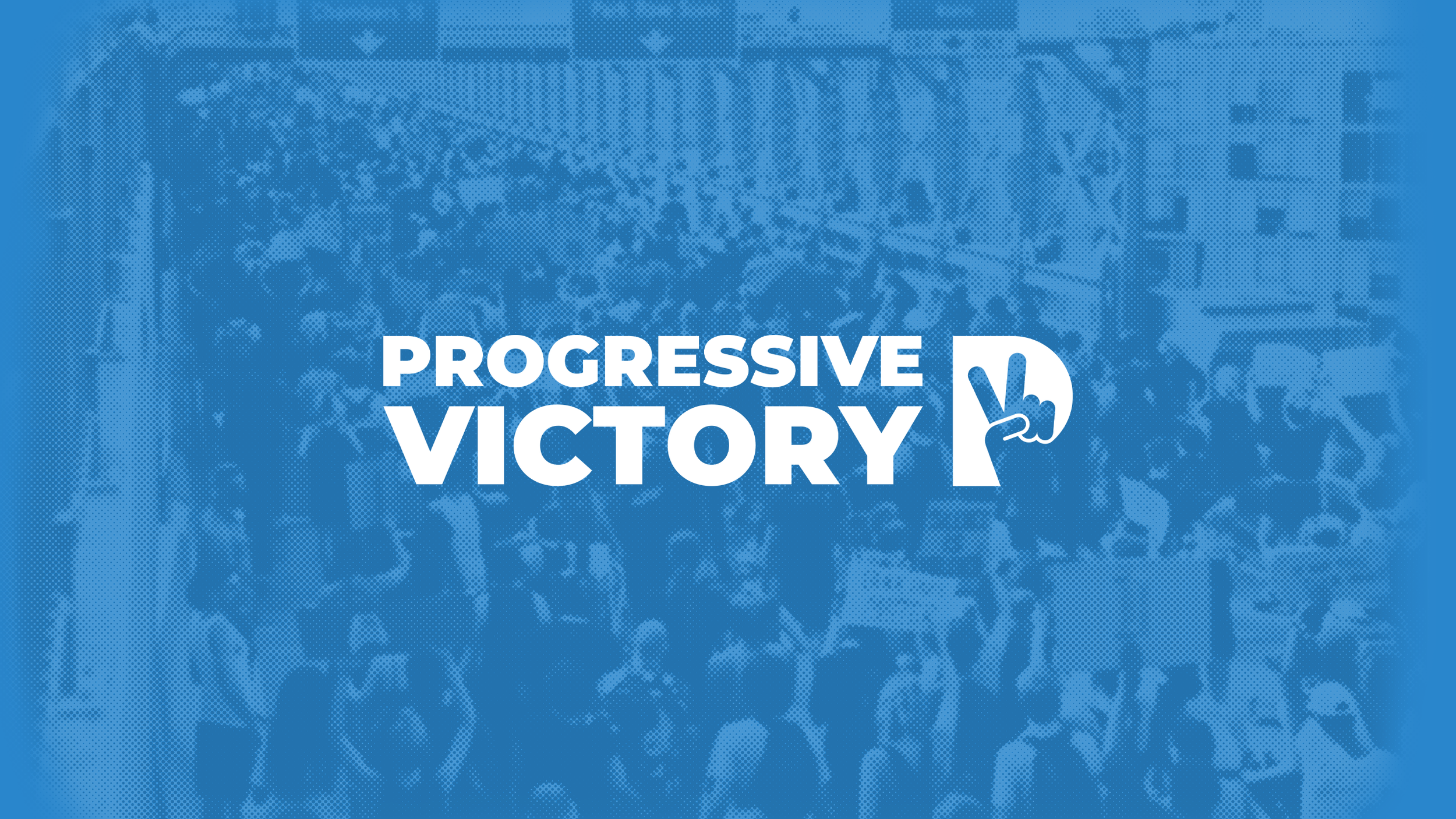 Crowd of people holding signs and banners with the words "Progressive Victory" and a peace sign in the foreground, at a rally or protest.