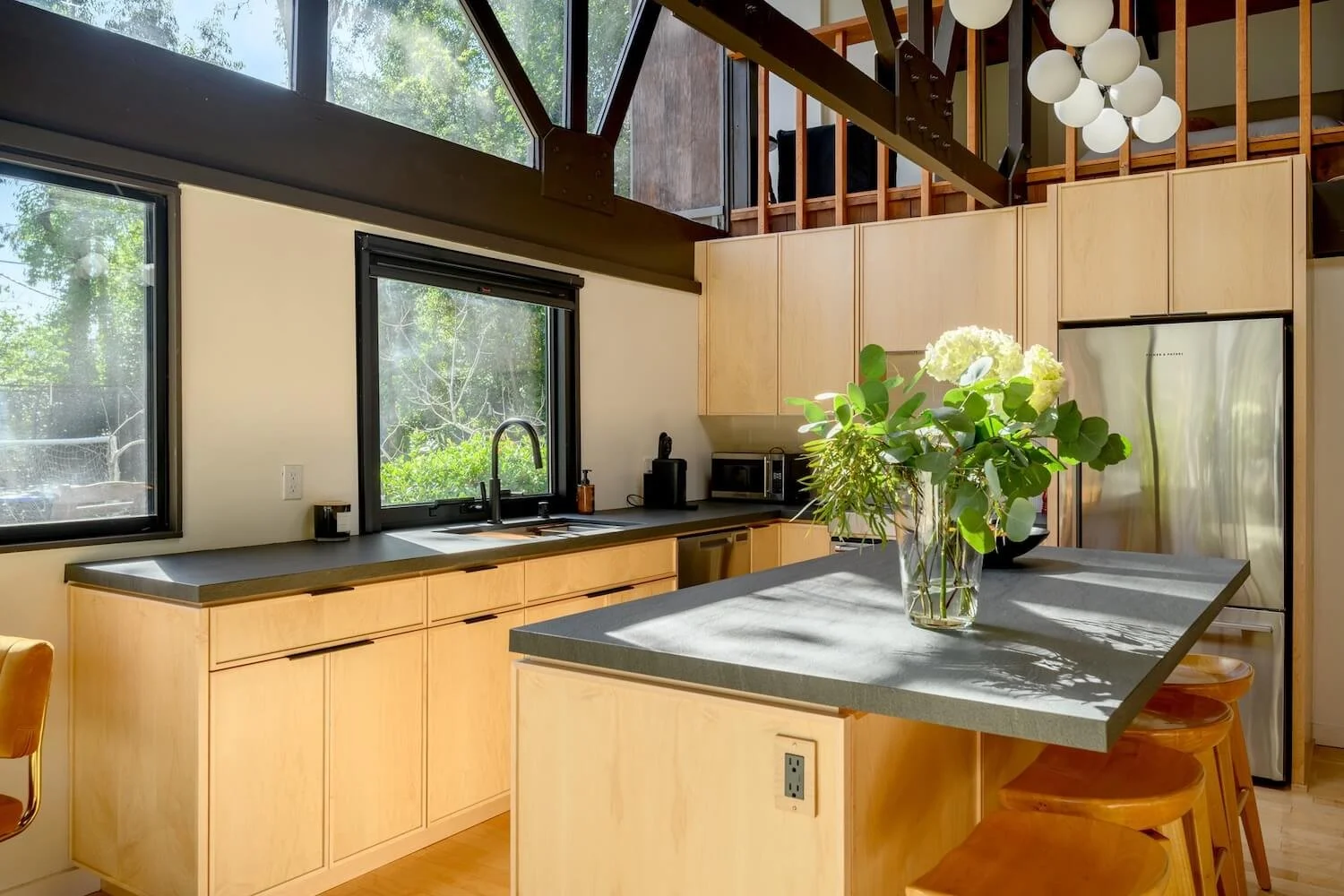 A focused perspective of the primary kitchen workspaces