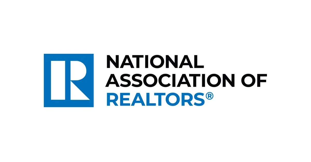 Logo of the National Association of Realtors, featuring a stylized blue house and the organization name in black and blue text.