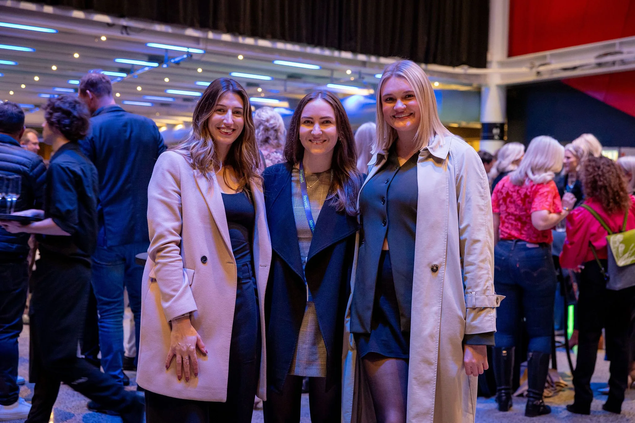 Three guests at a Revved event
