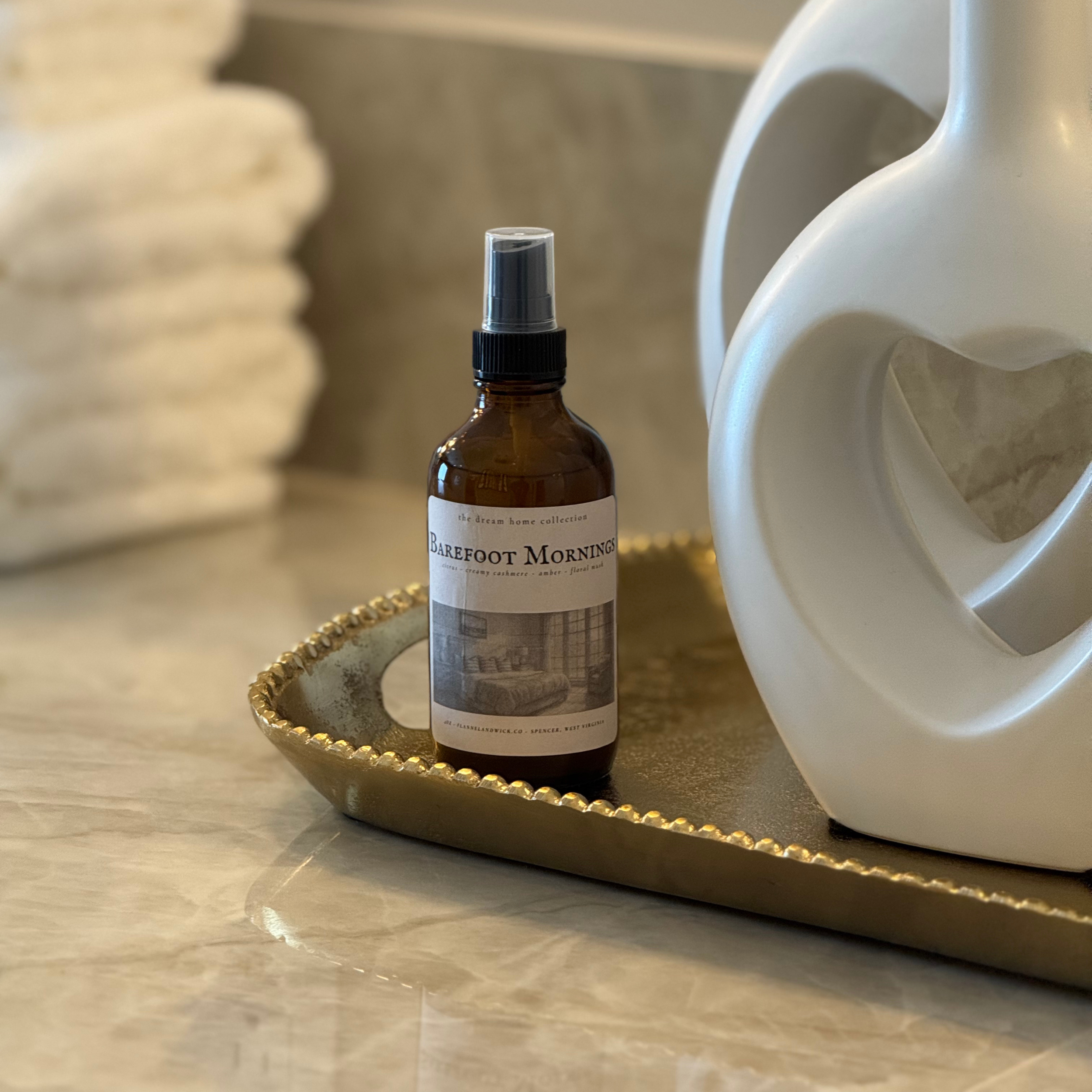 barefoot mornings room spray 4oz next to towels (1).png