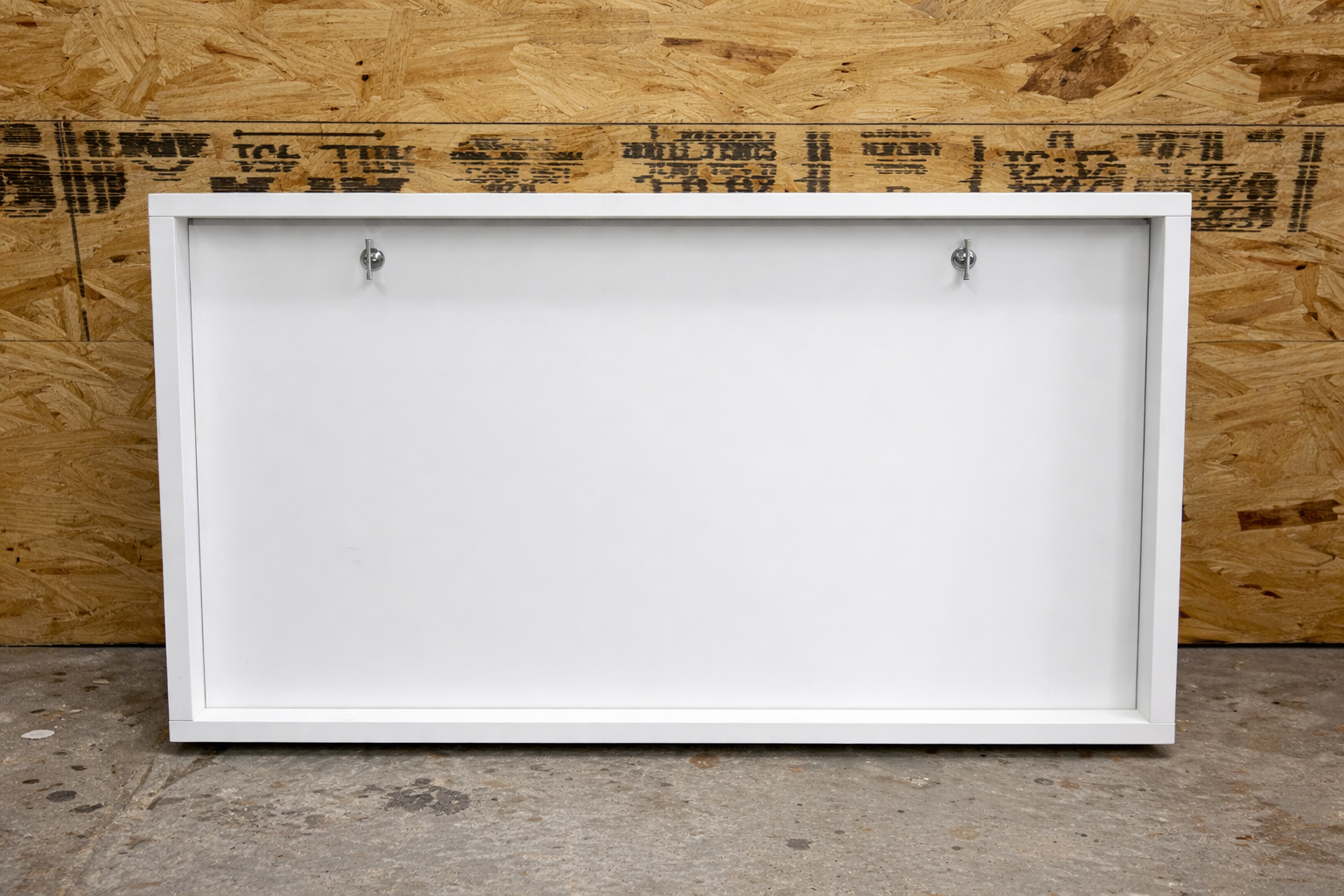 White access panel on workshop wall.png