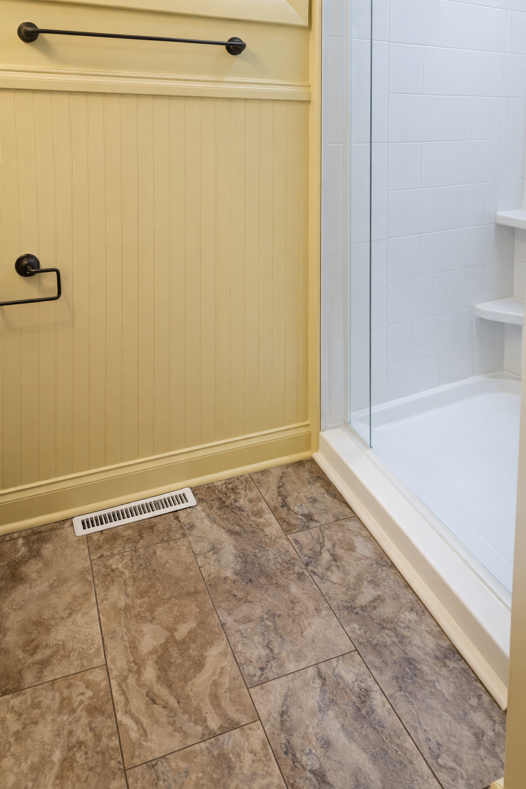 Bathroom corner with tiled floor details.png