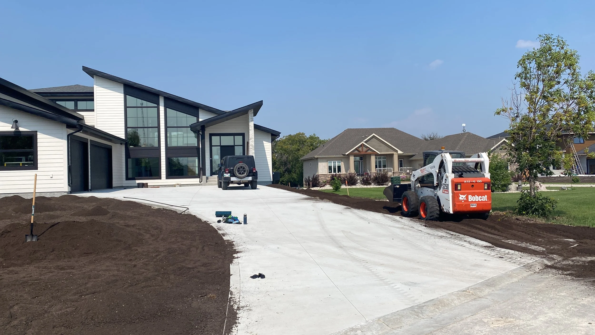 Oranssi technician working on a roof project