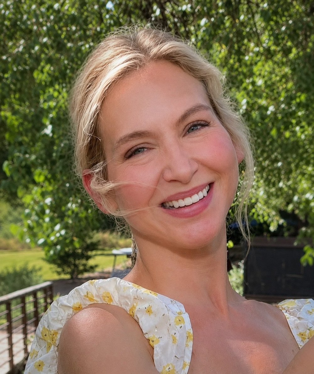 Ali Blackmon smiling outdoors