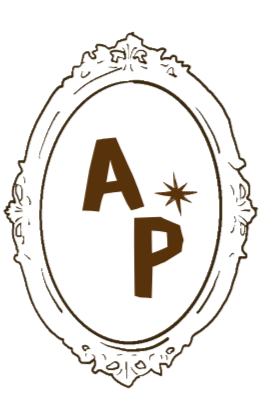 An ornate oval frame with the letters 'A*P' inside.
