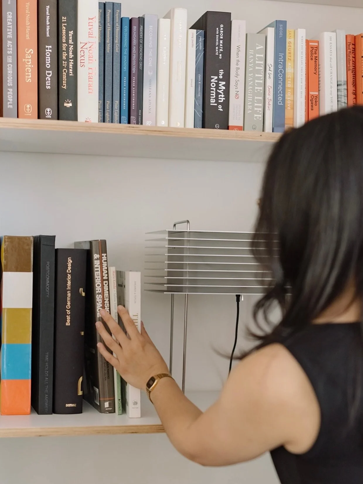 A full shelf can be an organized shelf.
Organized doesn&rsquo;t have to mean empty. It means you can find what you&rsquo;re looking for, and you enjoy what you see when you look at it.