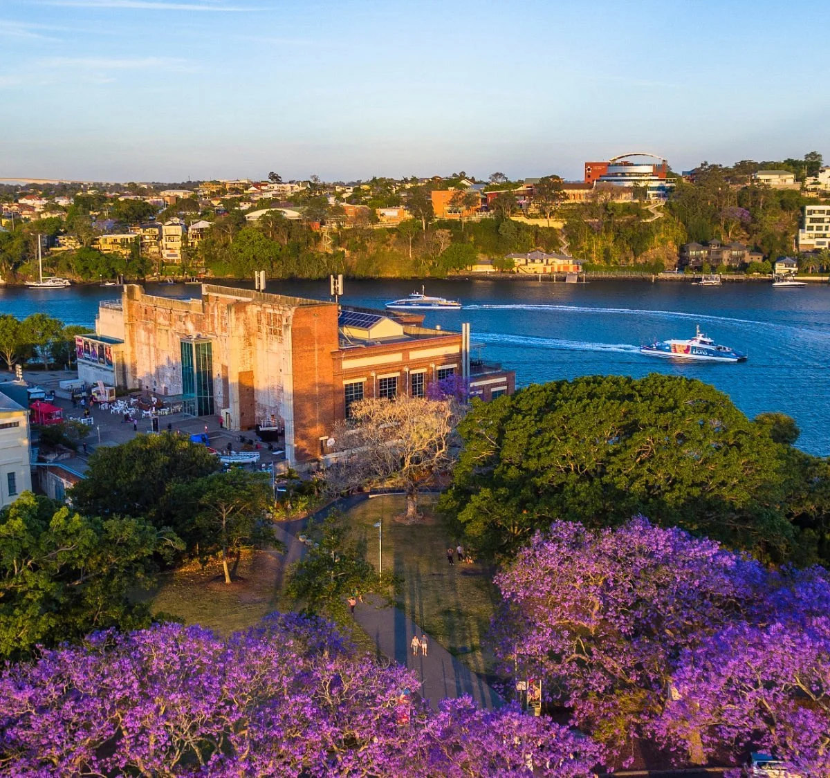 Aerial photo of the Brisbane Powerhouse in New Farm Park, on the banks of the Brisbane River