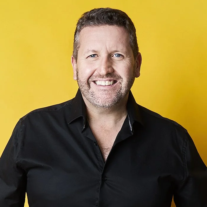 Photo of Stephen smiling at the camera
