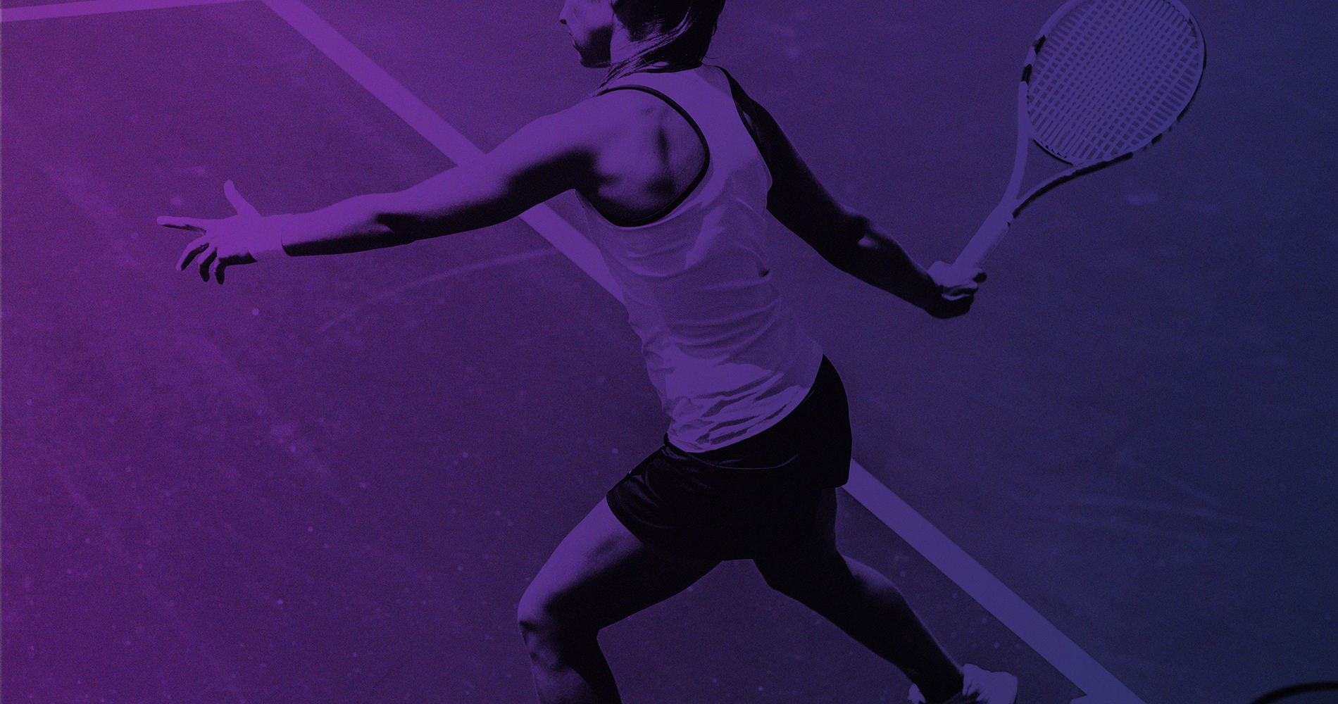 A female tennis player is in the middle of a match on a tennis court, wearing a tank top and shorts, holding a tennis racket, preparing to hit the ball.