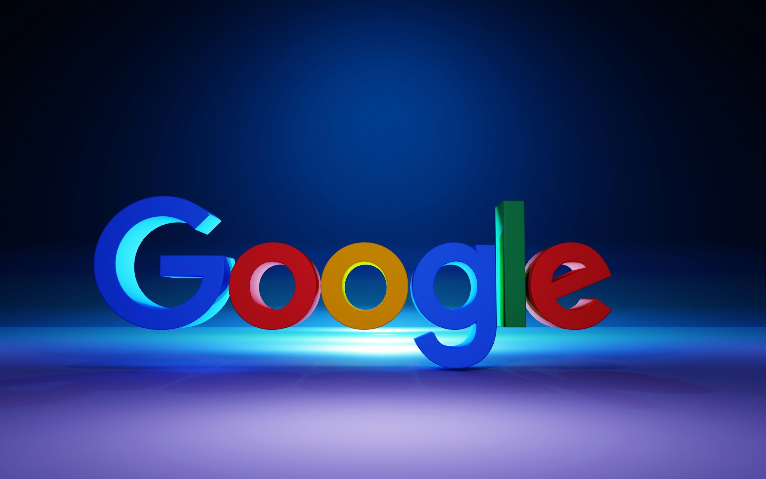Colorful 3D Google logo on a dark background with illuminated reflection.