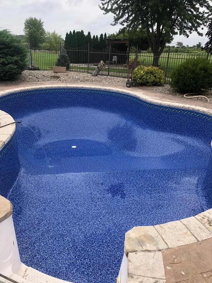 Inground swimming pool after liner replacement.