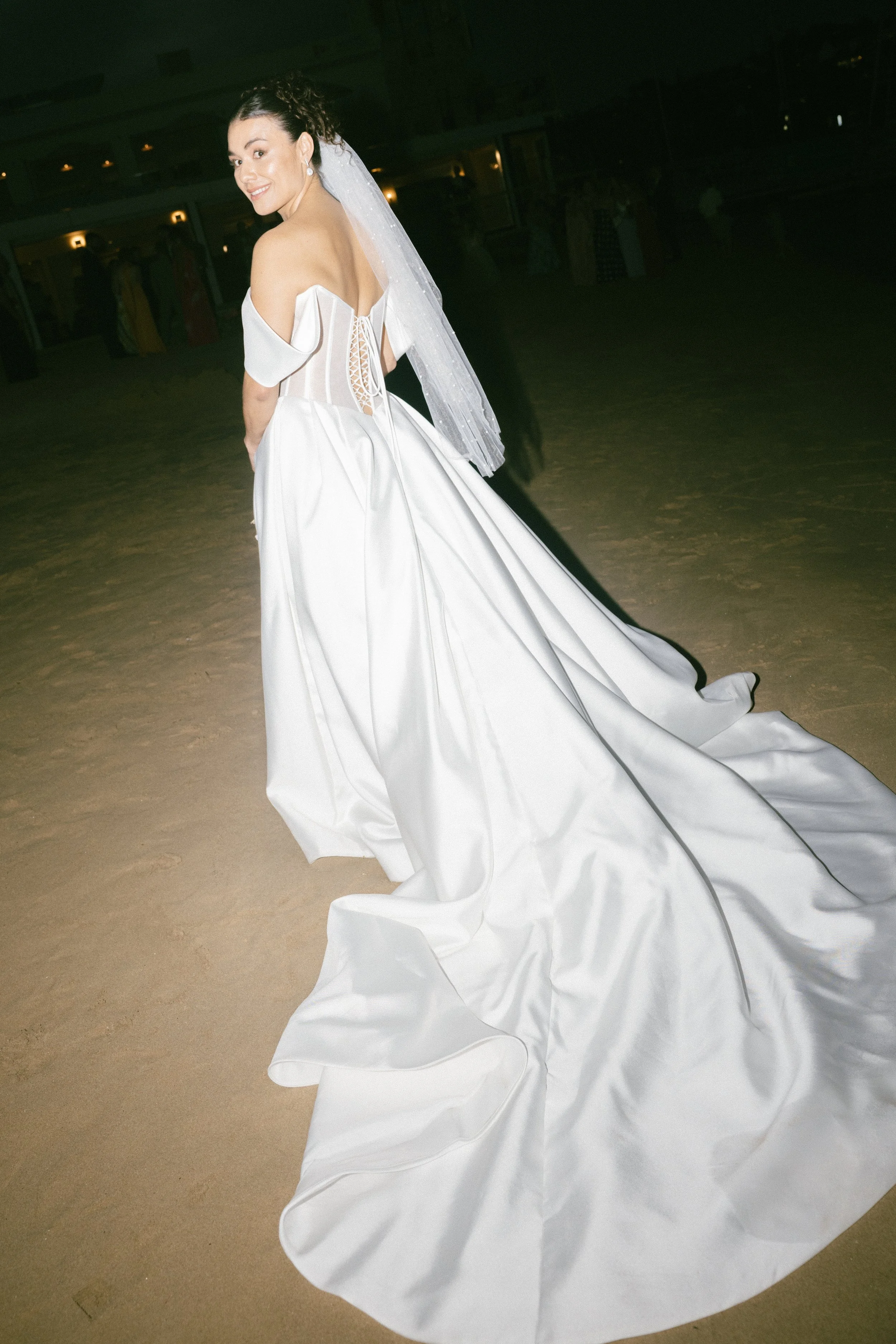 bride in long white train dress