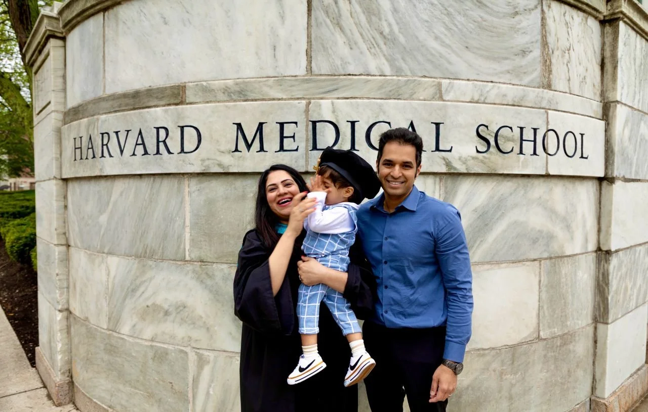 Rinki Varindani Desai and Family celebrating graduation in front of Harvard Medical School
