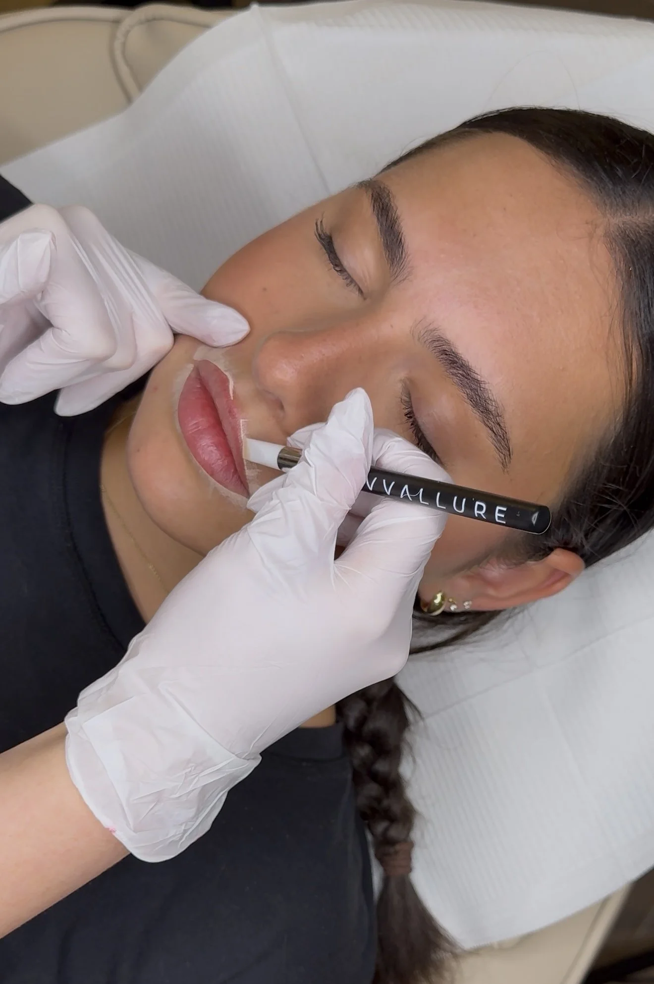 Cosmetic tattoo educator teaching PMU students