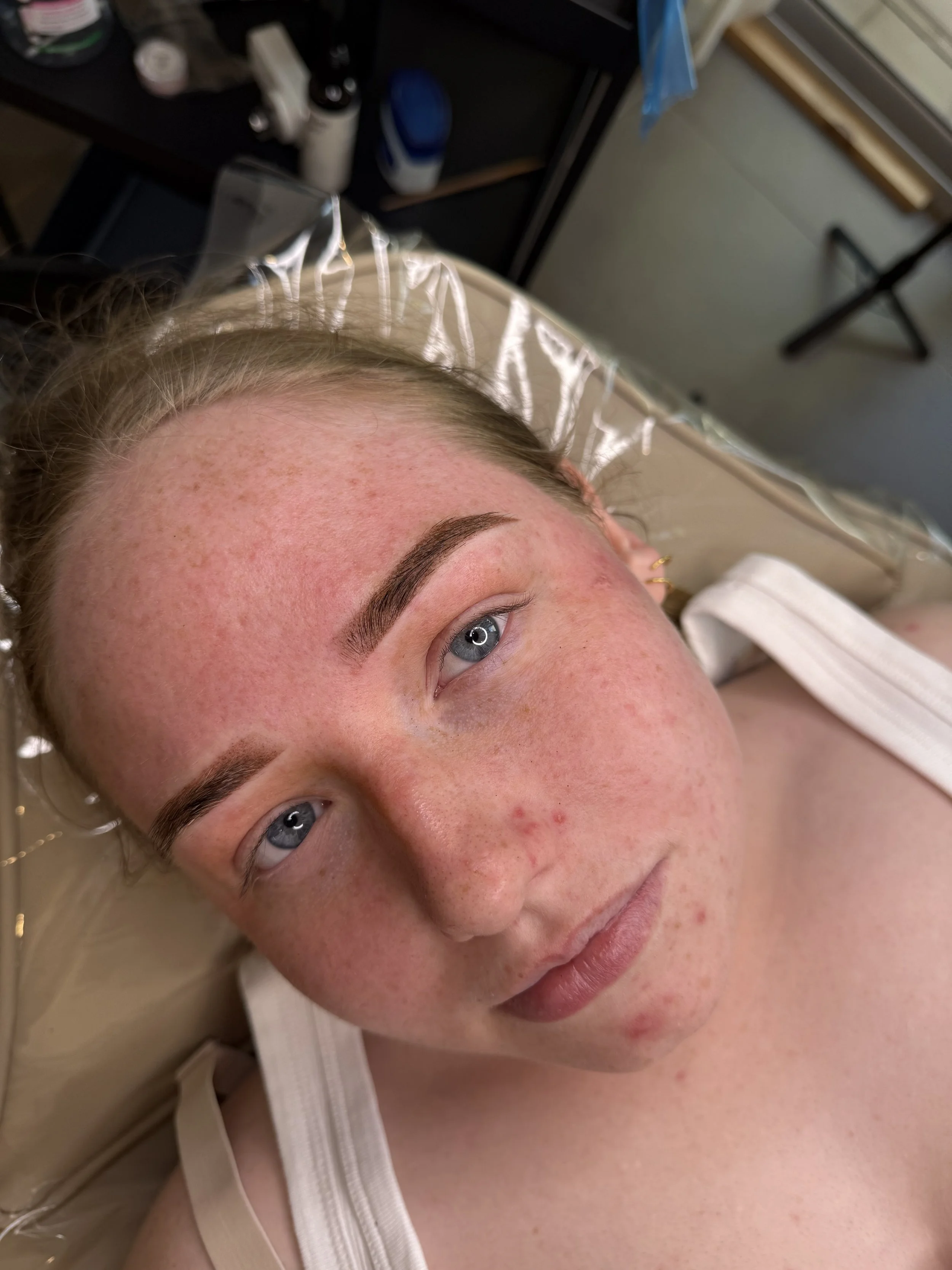 Healed powder brow cosmetic tattoo result with soft shaded finish