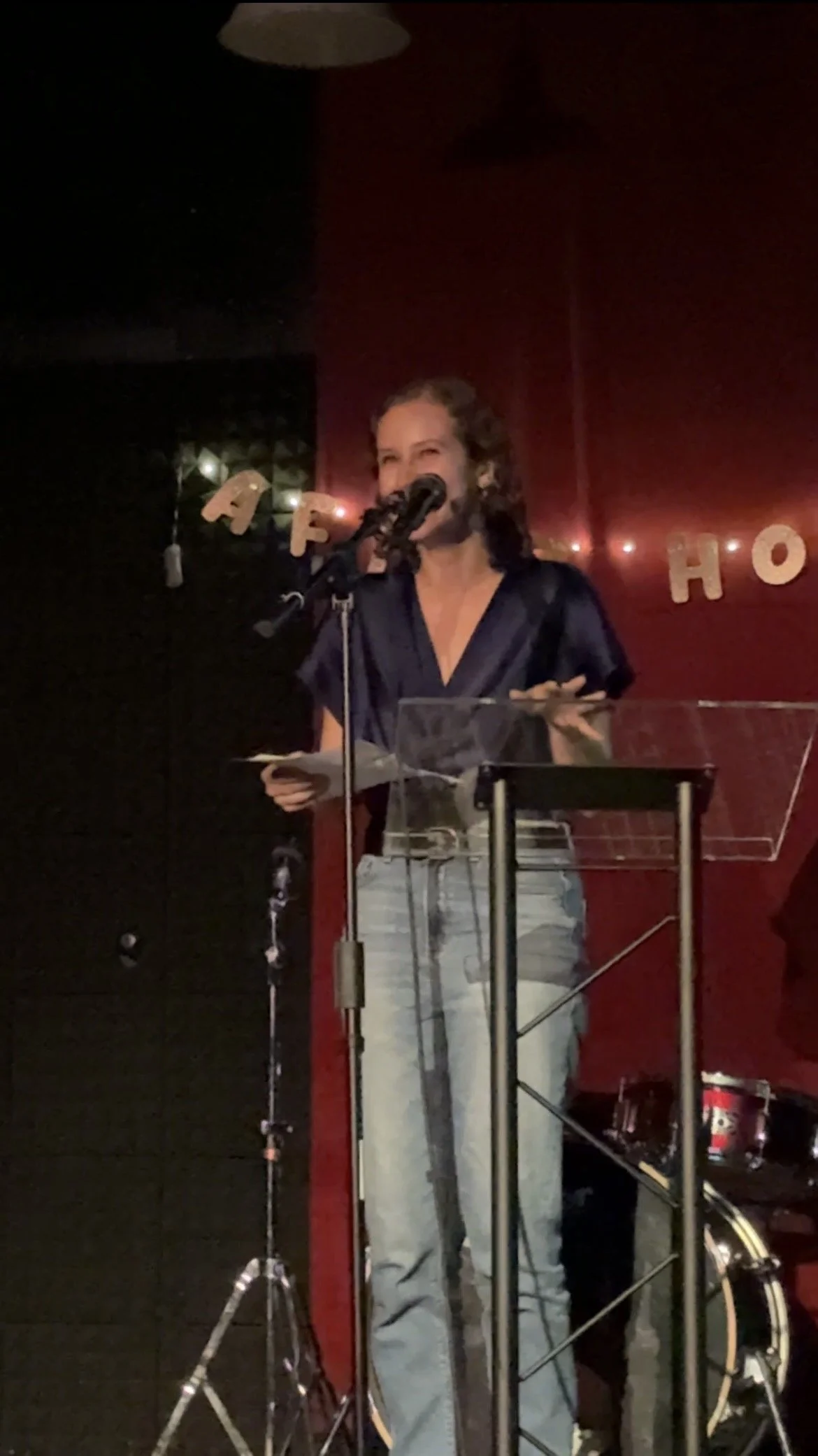 Jacqueline reads her work.