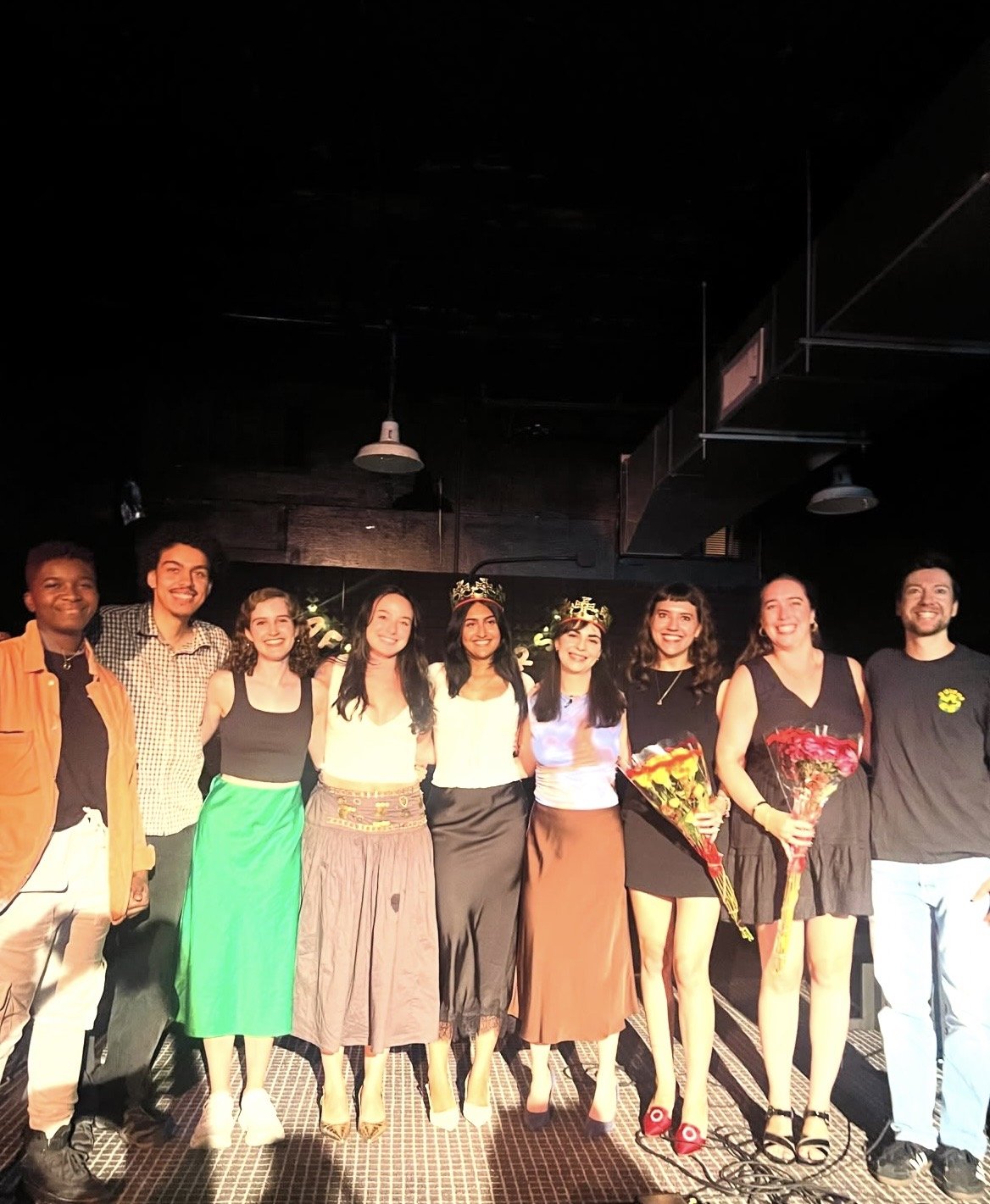 The group of readers smile for a photo.