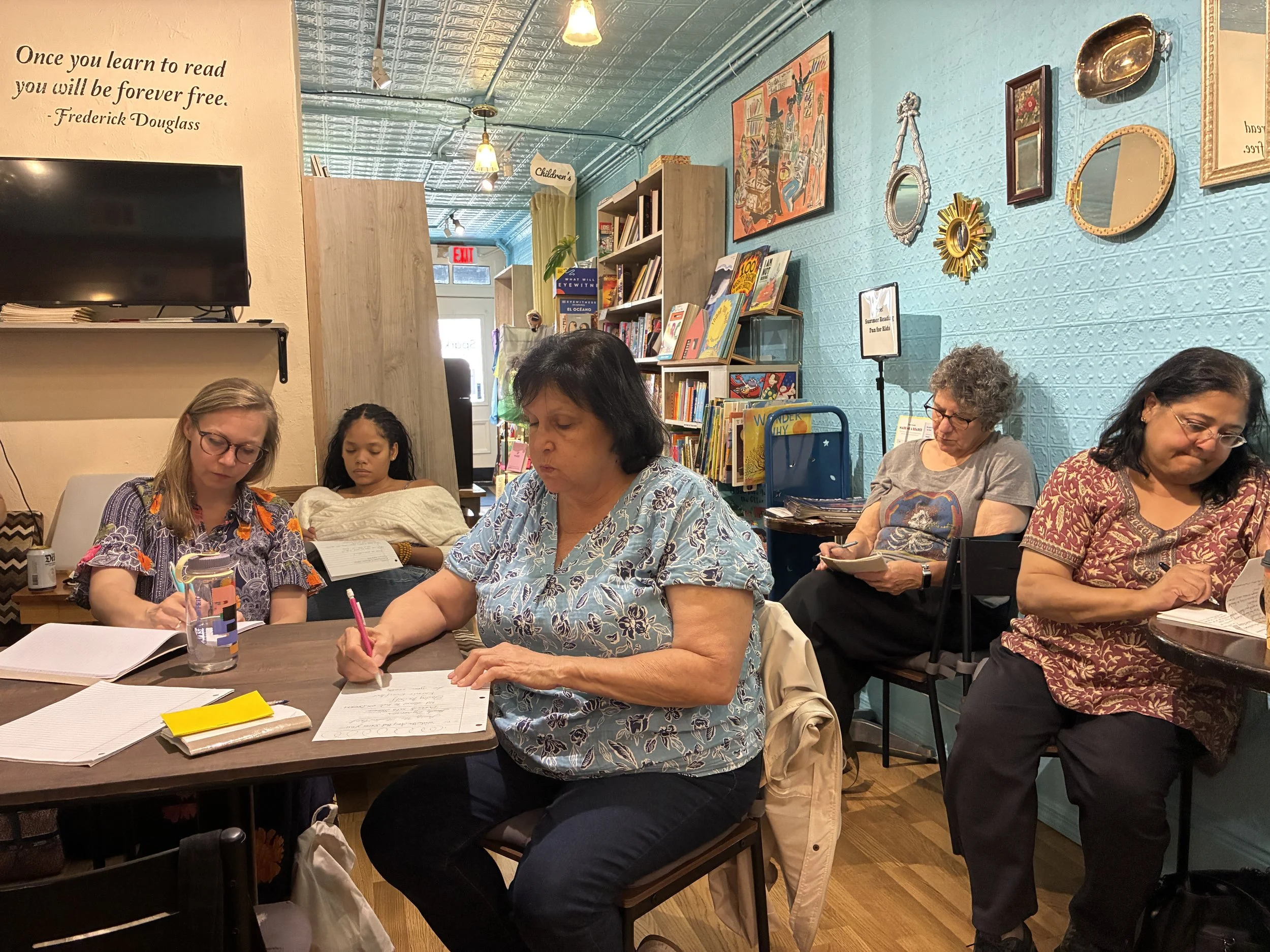 Writers attending Jacqueline's workshop write together.