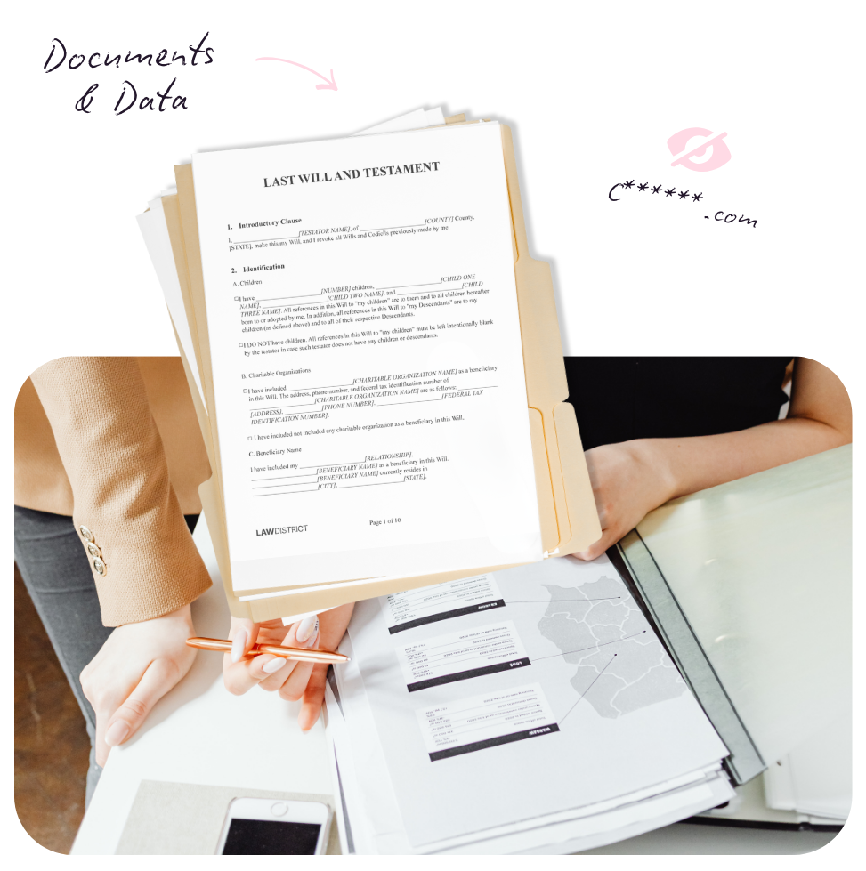 Hands holding a bunch of legal documents, one titled 'Last Will and Testament,' with a laptop, papers, and a smartphone on a white table.