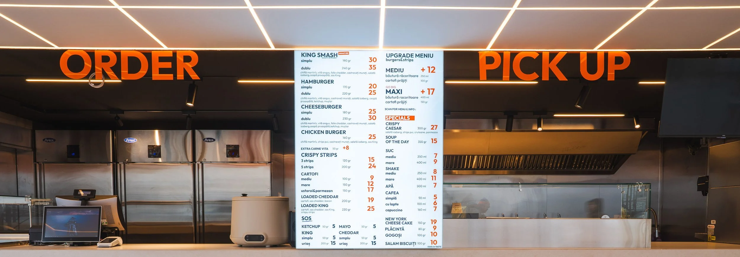 Design fast food cu zonă ORDER și PICK-UP și flux clar de servire Spațiu restaurant burger cu meniu vizibil și organizare liniară