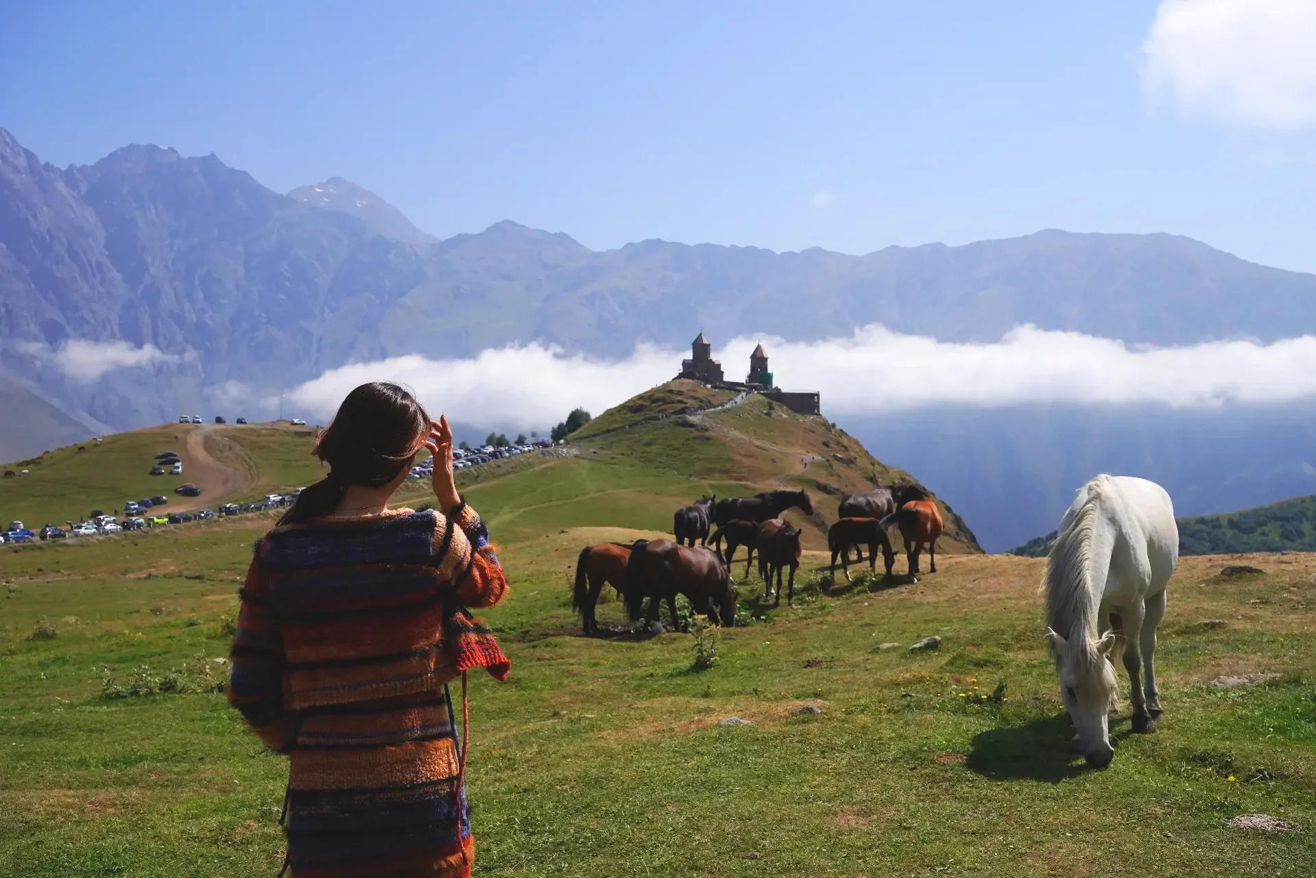 Visit the iconic Gergeti Trinity Church and witness the majestic beauty of Mount Kazbek in the High Caucasus.