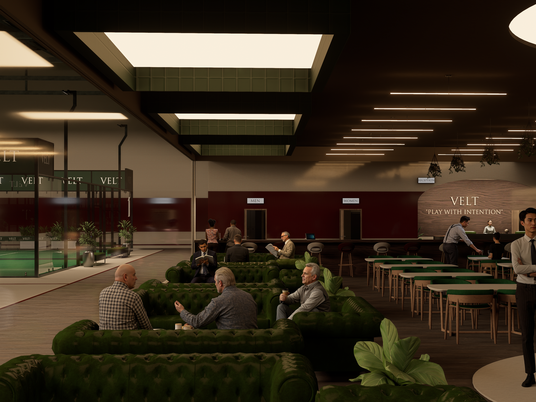 People sitting and chatting in a lounge area with green sofas, tables, and bar. Signs indicating men's and women's restrooms are visible behind the bar. A sign on the wall reads 'Velt, Play with Intention'.