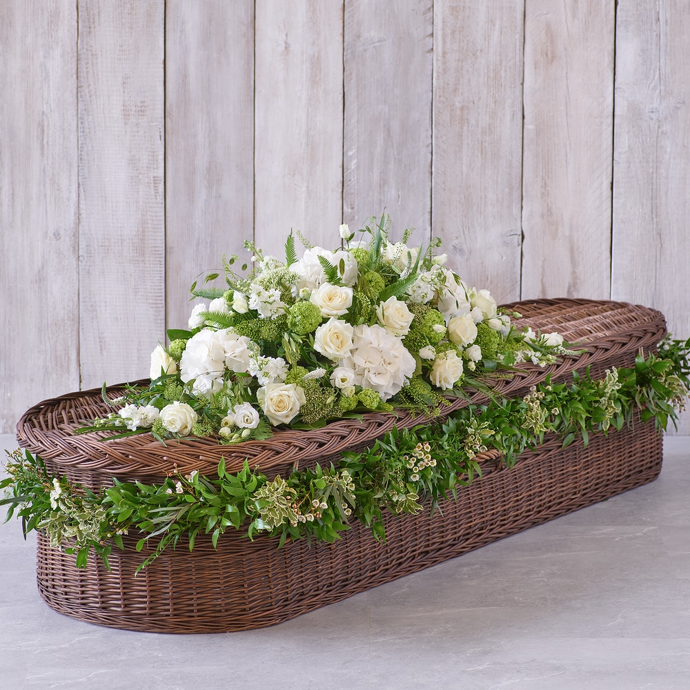 Large White Casket Spray with Garland.png
