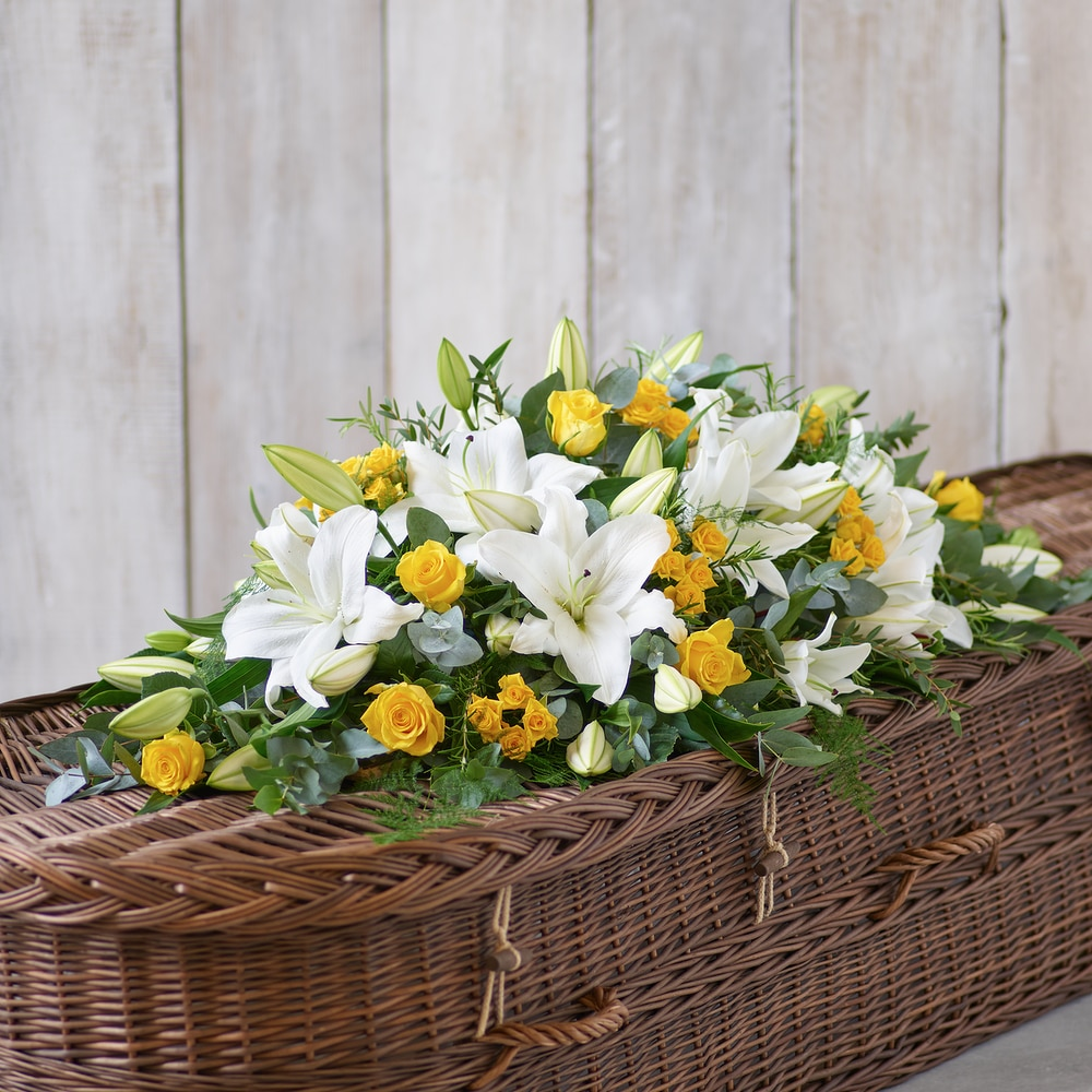 Lily and Rose Casket Spray.png
