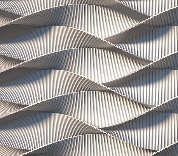 Abstract architectural facade with wavy, metallic panels.