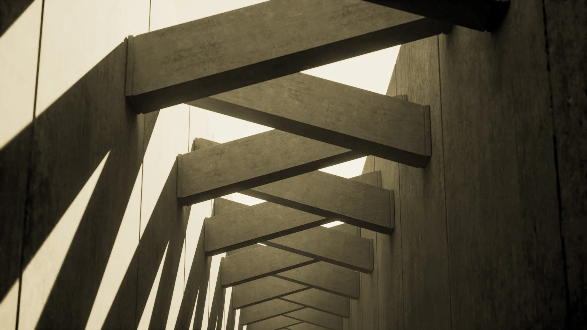 Close-up of zigzag structure viewed from below, against a pale sky background.
