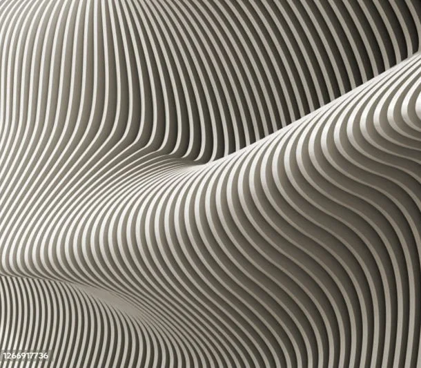 Abstract, flowing patterns created by layered, curved lines in shades of gray and white.