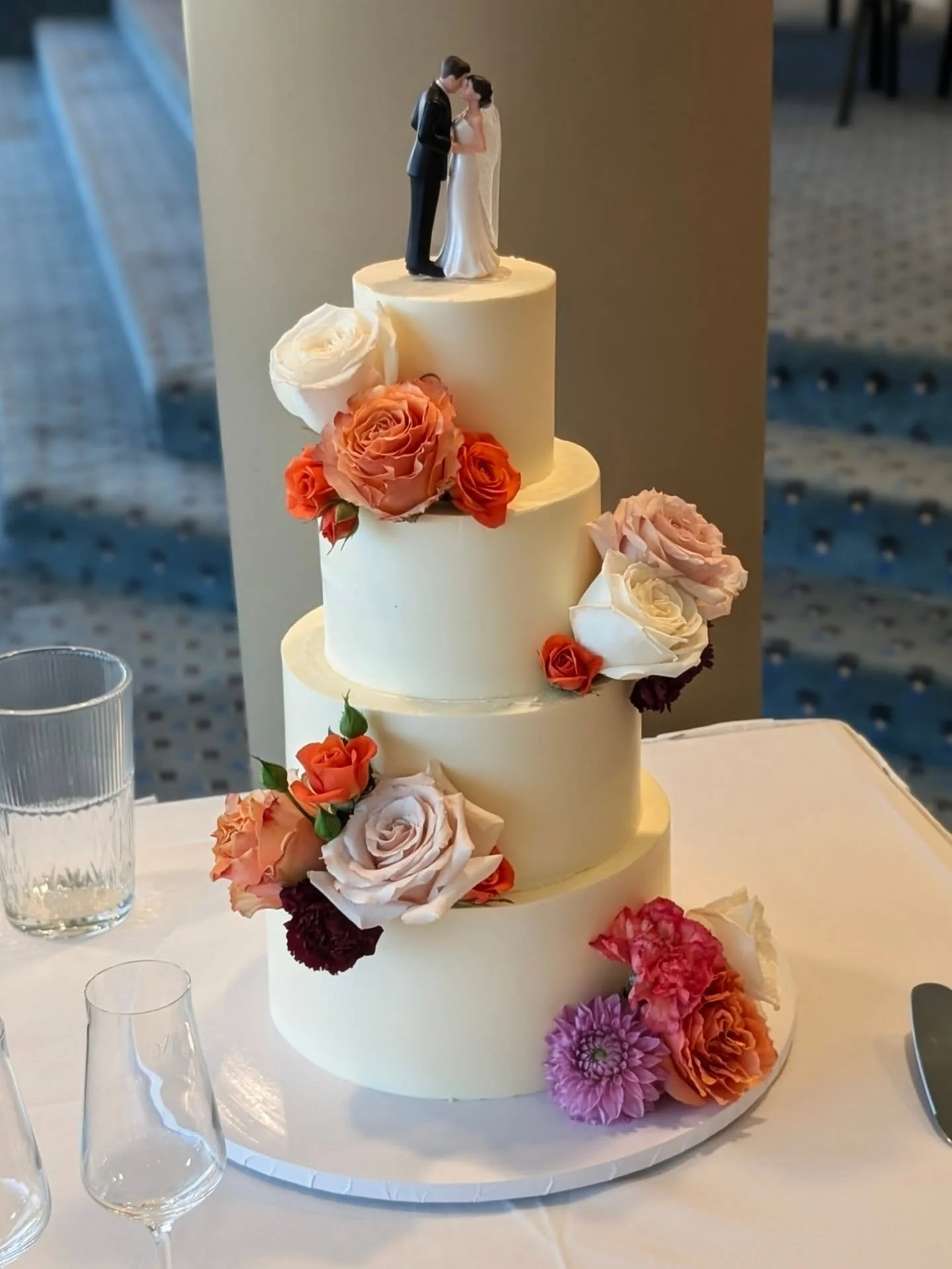 Congratulations Danielle &amp; Bailey 🥂💞

Four tiers, four delicious flavours, and every cake and filling made completely from scratch. 🤍

🍓 Vanilla cake with strawberry coulis
🍪 Vanilla cake with salted caramel and Biscoff buttercream
🌰 Chocol