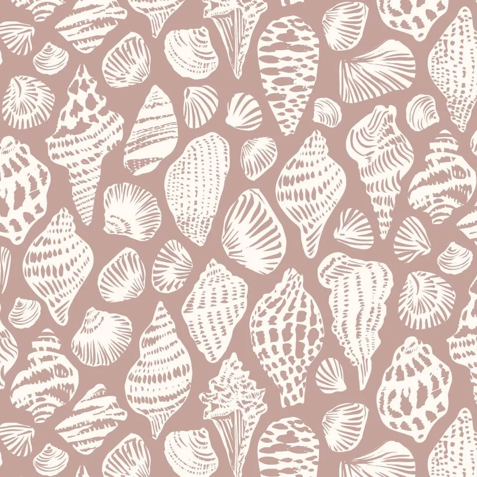 Collected Beach Shells: Dense coastal shell repeat featuring hand-drawn seashells in cream on a soft blush background. Designed as a richly layered coordinate for wallpaper, textiles, home decor, and interior pattern collections.