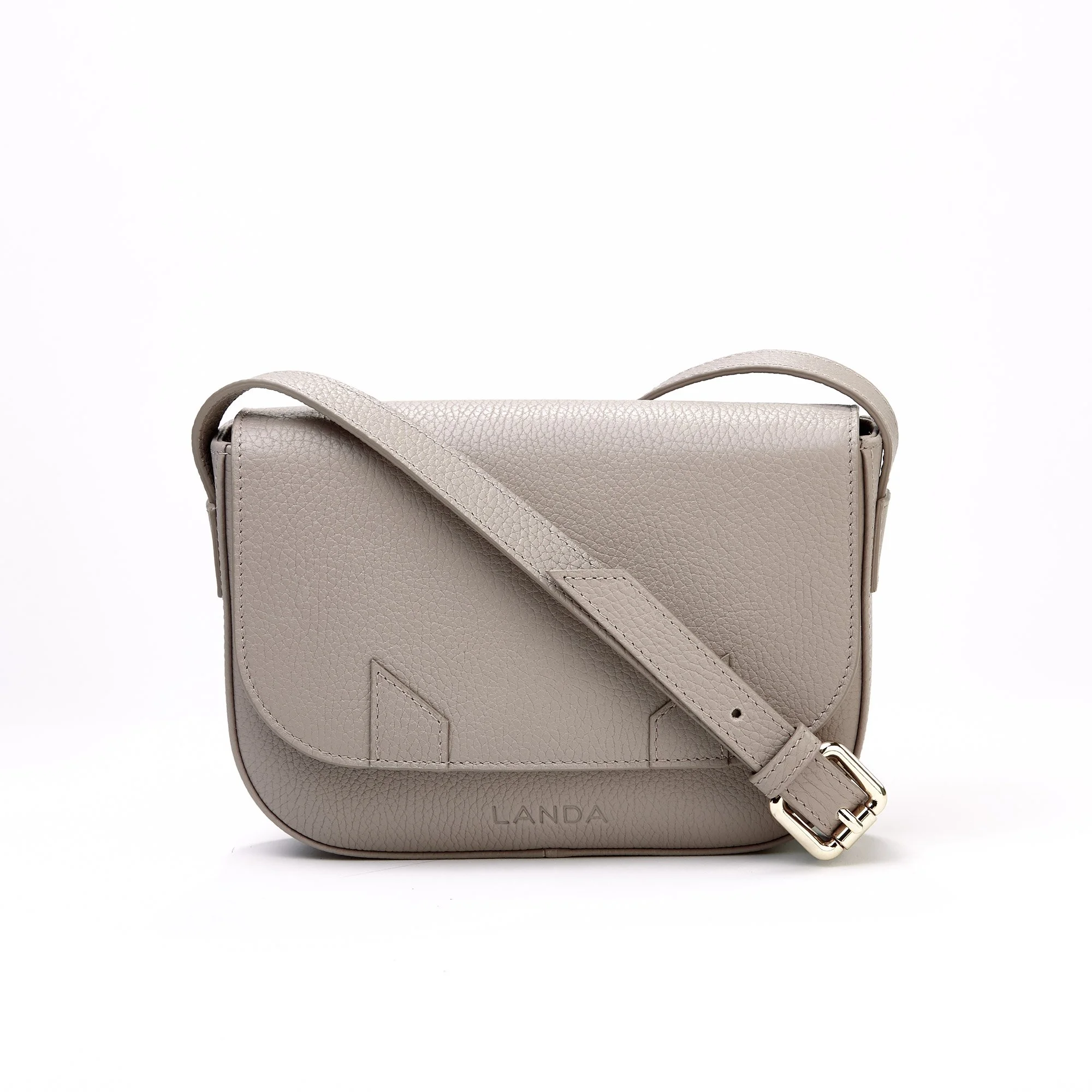 High end advertising profession product photo taken in studio of a a beige leather crossbody bag with textured surface and a front flap, with the brand name 'LANDA' embossed at the bottom center, displayed against a plain white background.