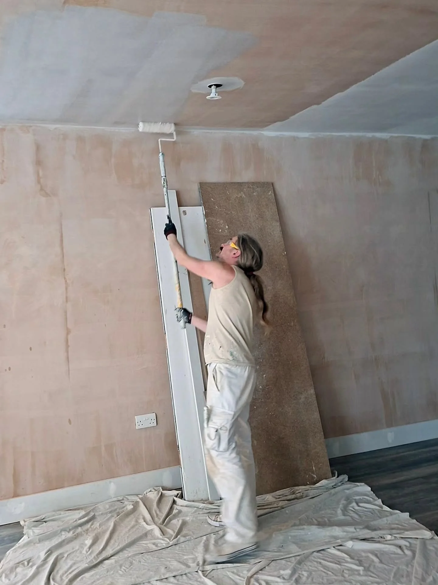 Painting a newly plastered wall in Soho. #plastering #painterdeocoratorsutton #paintinganddecorating #paintingwalls