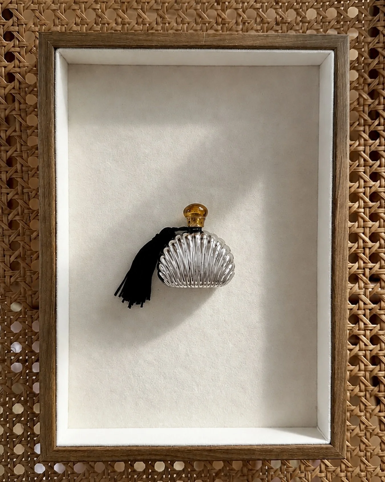 Vintage Art Deco perfume bottle in a sculptural silver-tone shell design, circa 1930s.
Available at thechicaunt.com.
Complimentary shipping until August 28 with code CHICVACATION.