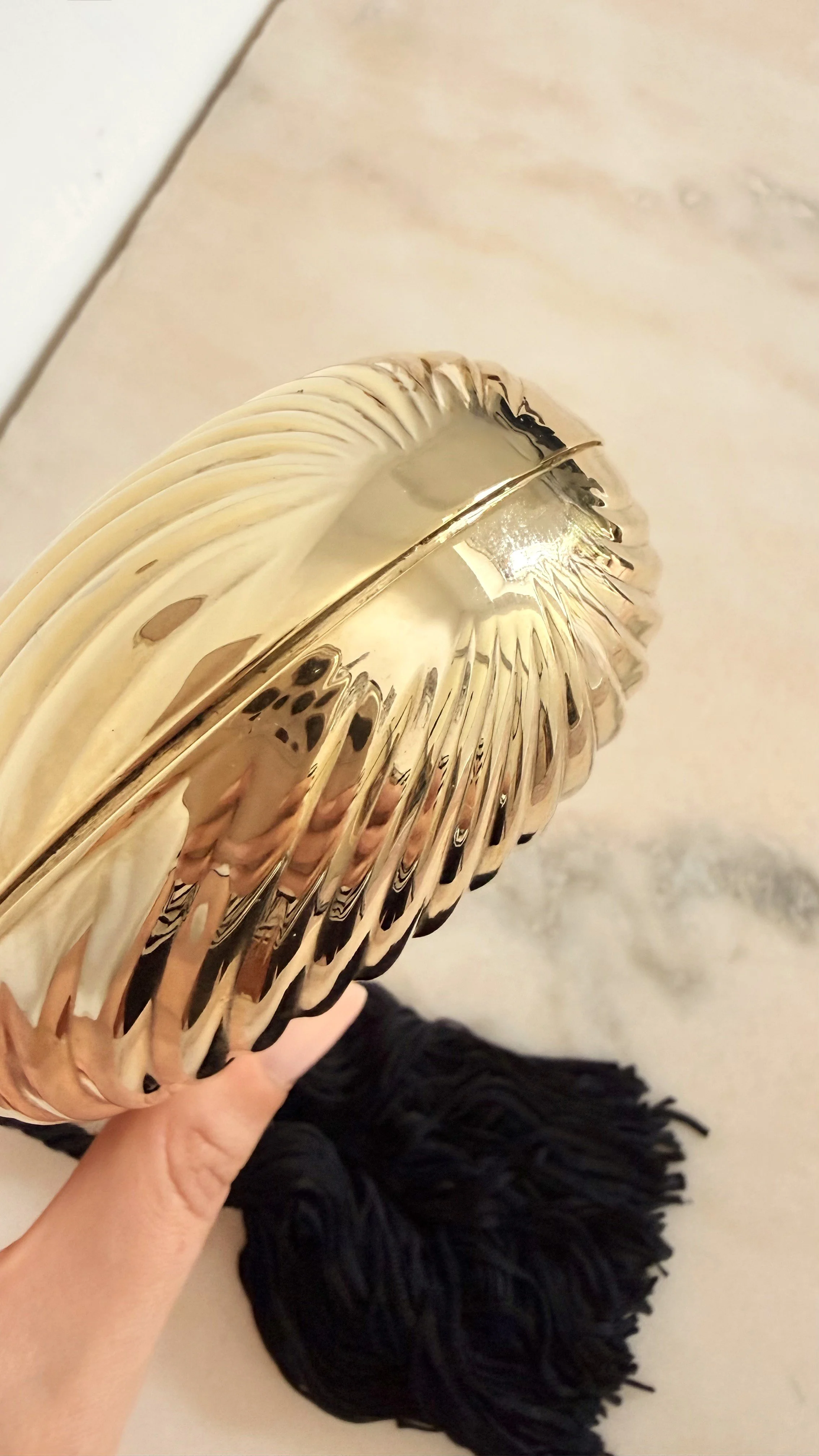 GOLD RIBBED EGG MINAUDIÈRE WITH TWO TASSELS 9.jpeg
