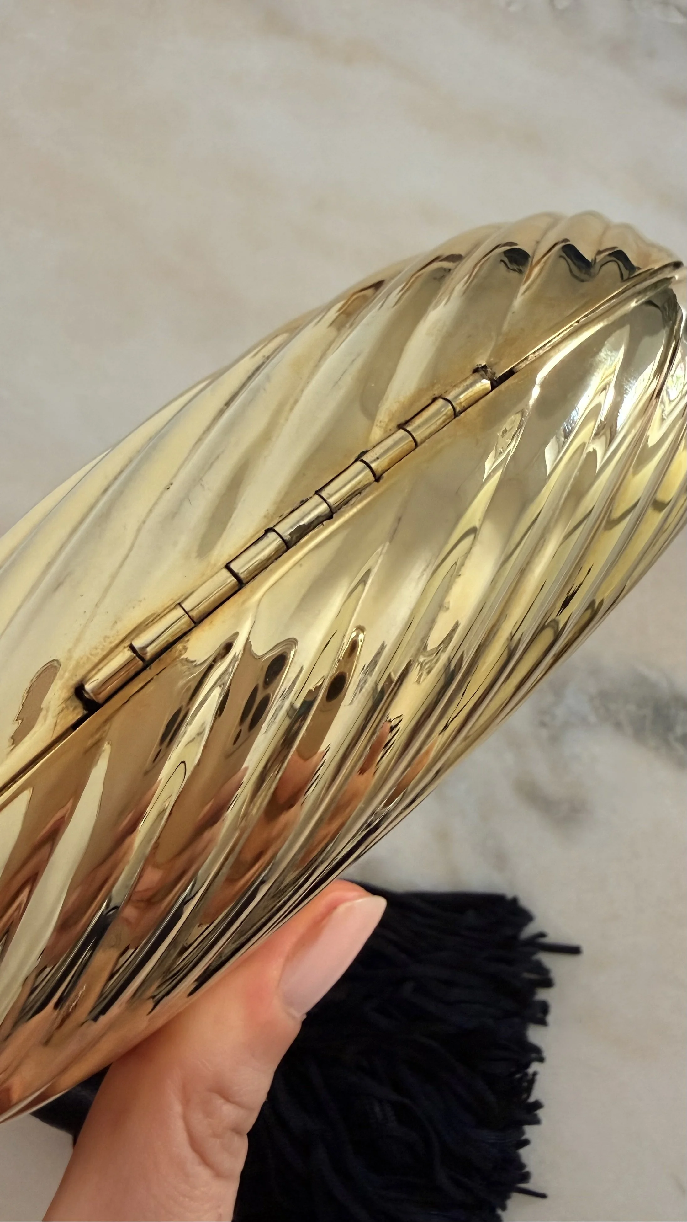 GOLD RIBBED EGG MINAUDIÈRE WITH TWO TASSELS 8.jpeg